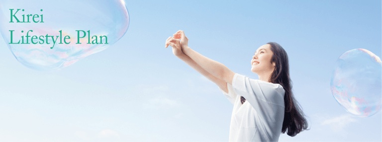 Young Woman in sky with bubbles